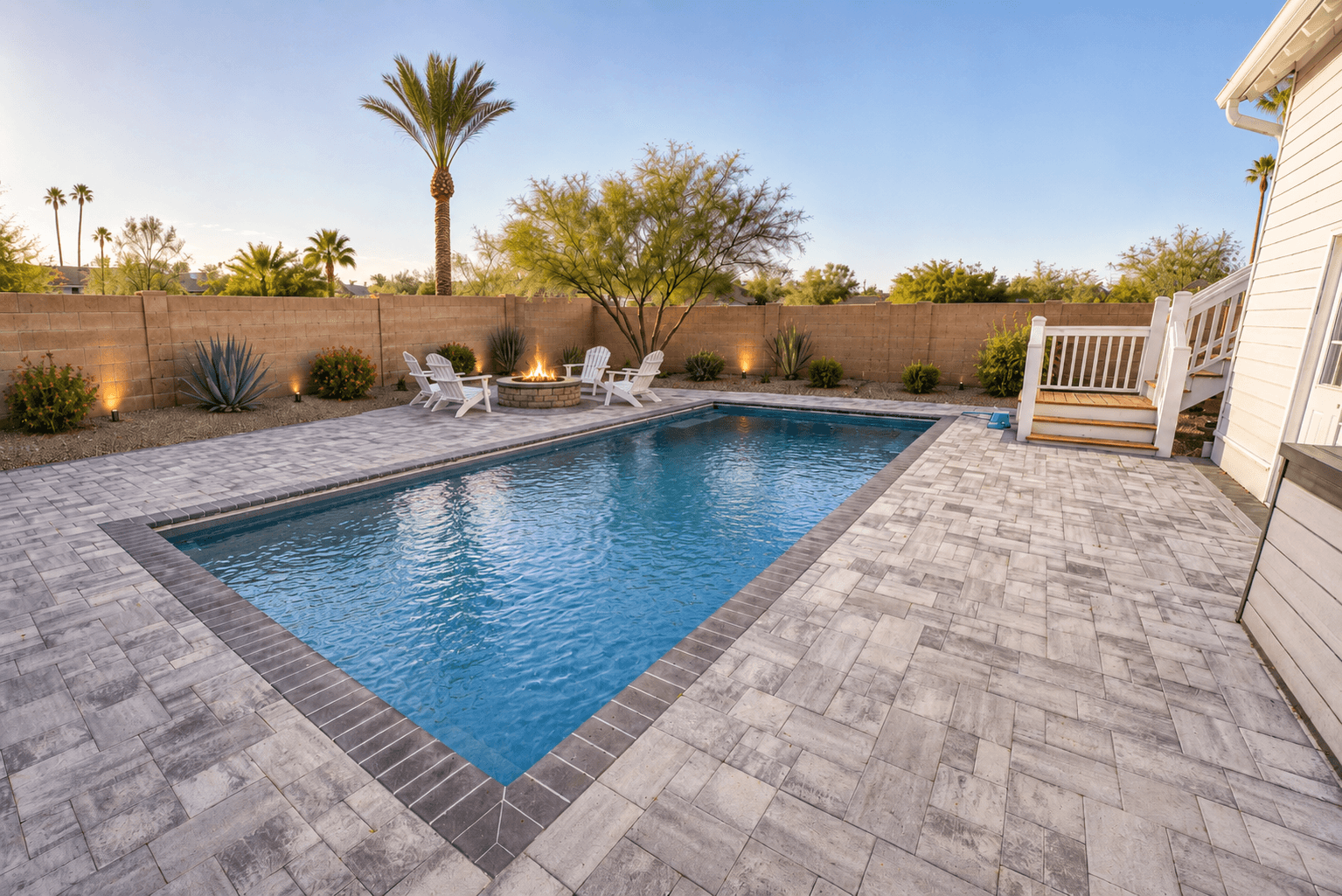 Pavers installed around a pool — Phoenix, AZ
