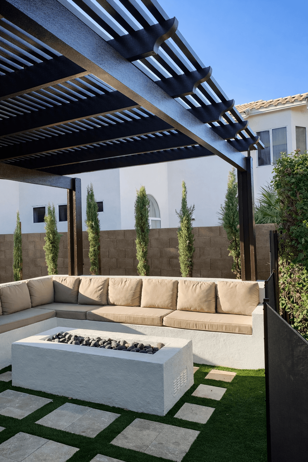 Backyard with pergola, fire table, and turf — Chandler AZ